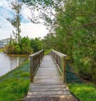 a wooden bridge over water